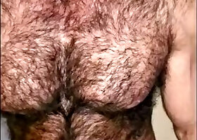 Hairy muscled hunk flexing pits and teasing