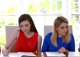 Two American ladies play with their math books