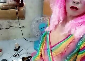 Transgender Le wears sexy clothes and plays cups of sex. Artificial cans