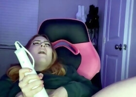 Amateur redhead poses and masturbates with toys