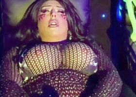 Chanel Santini Strokes in a Fishnet Bodysuit Under Neon